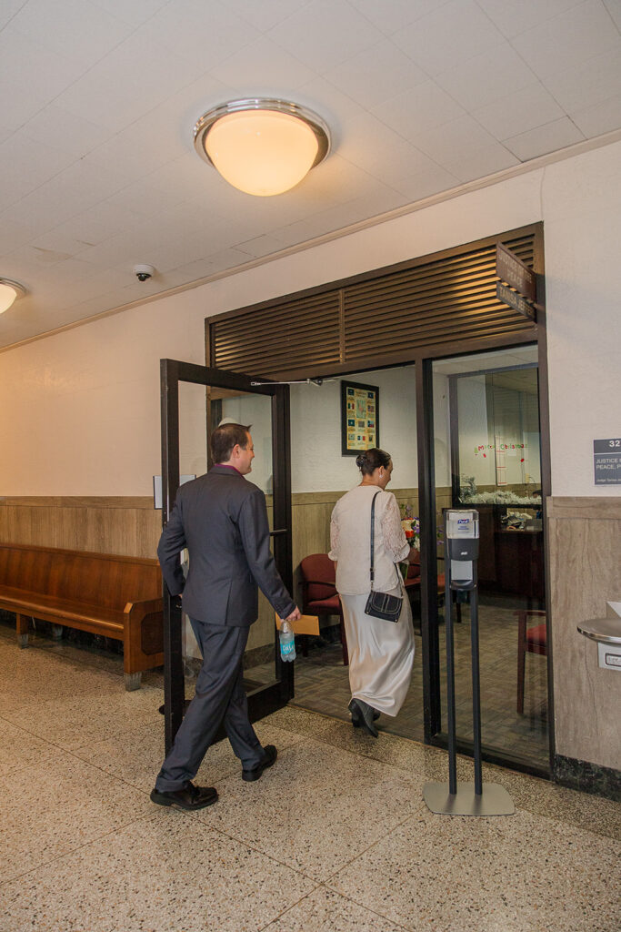Inside the courthouse, Rachele and Wes enter the 3rd floor Justice of the Peace Office to check in for the ceremony.